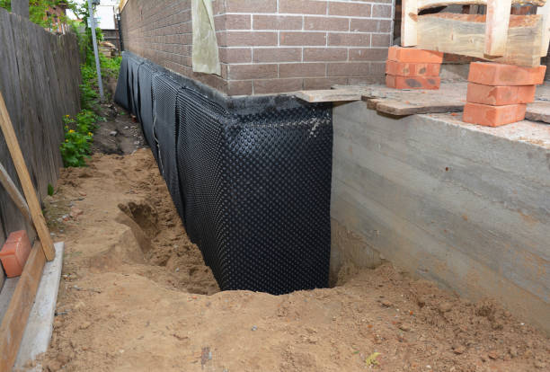 Happy homeowners after waterproofing job in Scottsburg